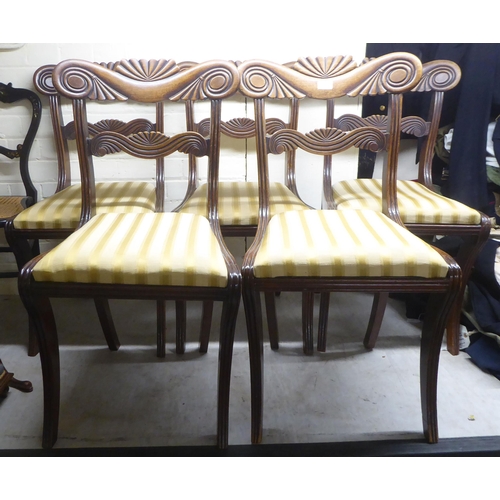 69 - A set of five William IV mahogany framed shell and fan carved, twin bar back dining chairs, the late... 