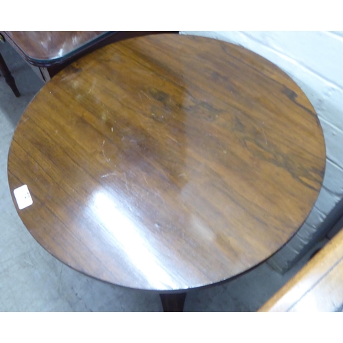 72 - A 19thC rosewood pedestal table, on a turned column and concave triform base  27.5