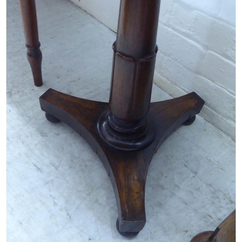 72 - A 19thC rosewood pedestal table, on a turned column and concave triform base  27.5