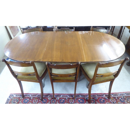 74 - Reproduction Regency style dining furniture, viz. a mahogany twin pedestal table  30