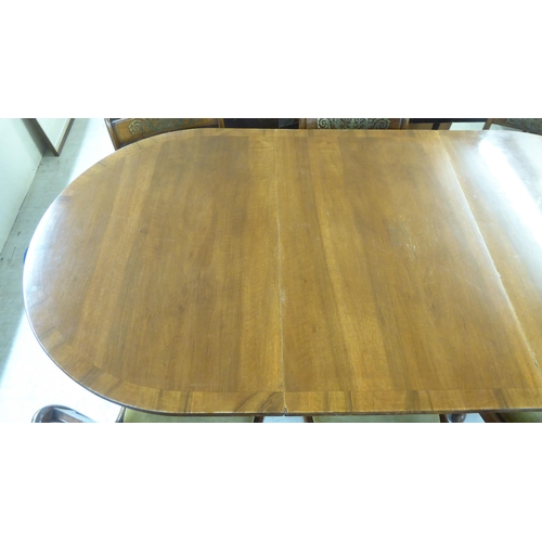 74 - Reproduction Regency style dining furniture, viz. a mahogany twin pedestal table  30