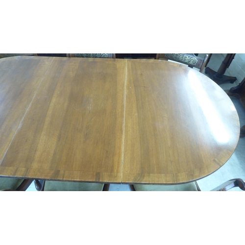 74 - Reproduction Regency style dining furniture, viz. a mahogany twin pedestal table  30