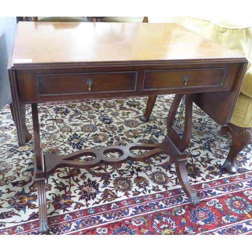 75 - A mid 20thC William IV style mahogany sofa table design occasional table, raised on lyre ends and sp... 