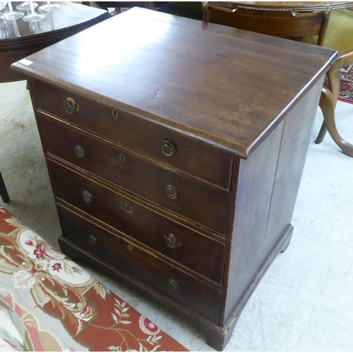 77 - An early/mid 19thC mahogany finished four drawer dressing chest, raised on bracket feet  30