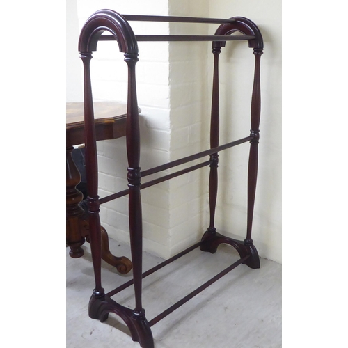 92 - Small 20thC furniture: to include a modern mahogany towel rail  36