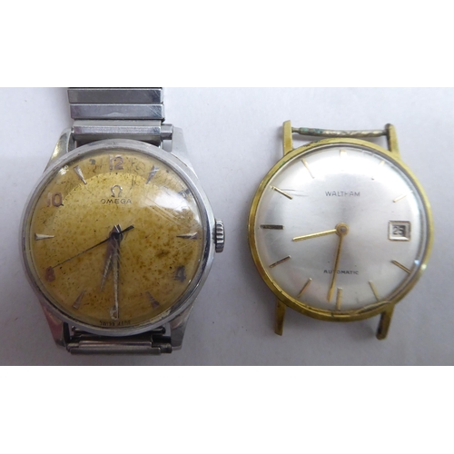 97 - Watches: to include an Omega, stainless steel cased wristwatch, faced by an Arabic dial