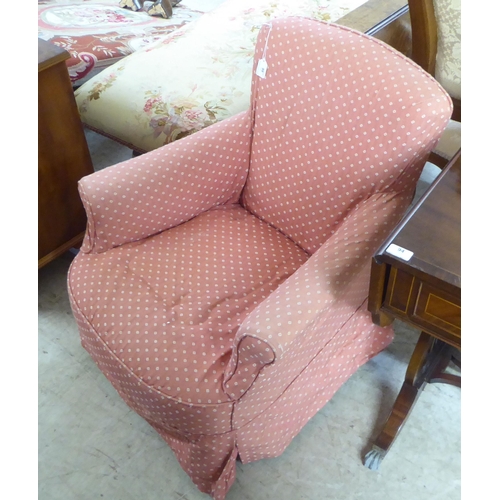 99 - An early 20thC and later fabric covered nursing chair, raised on square, tapered legs and casters&nb... 