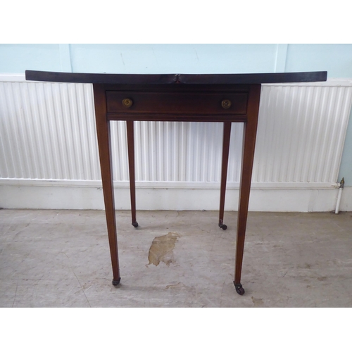 105 - An Edwardian satinwood inlaid mahogany envelope card table, raised on square, tapered legs and caste... 