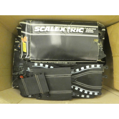 106 - Scalextric collectables  comprising cars, controllers, track and a transformer 