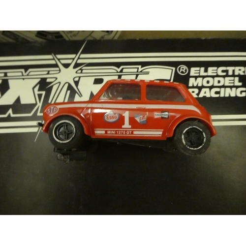 106 - Scalextric collectables  comprising cars, controllers, track and a transformer 