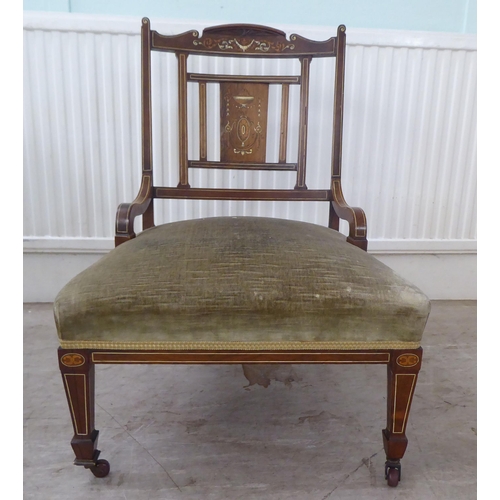 109 - Small furniture: to include an Edwardian marquetry inlaid mahogany framed bedroom chair with a splat... 