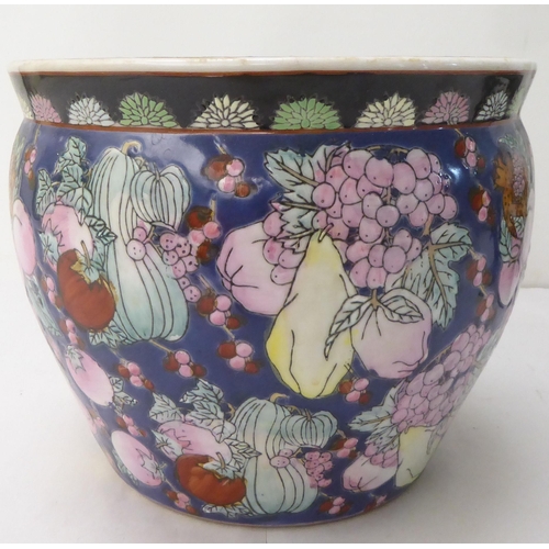 147 - Ceramics: to include an early 20thC Carlton Ware china vase and cover, decorated with flora  9