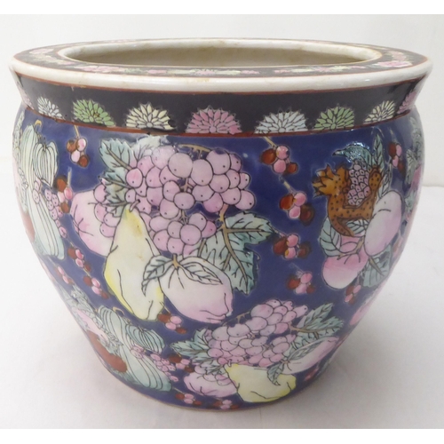 147 - Ceramics: to include an early 20thC Carlton Ware china vase and cover, decorated with flora  9