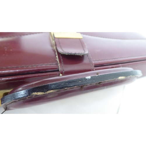 122 - Three similar brown leather brief/camera accessories cases&nbsp;
