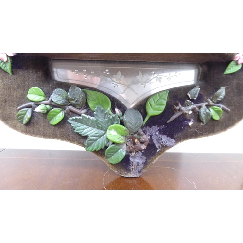 125 - A 1970s fabric covered four panelled, four shelf hanging mirror  24