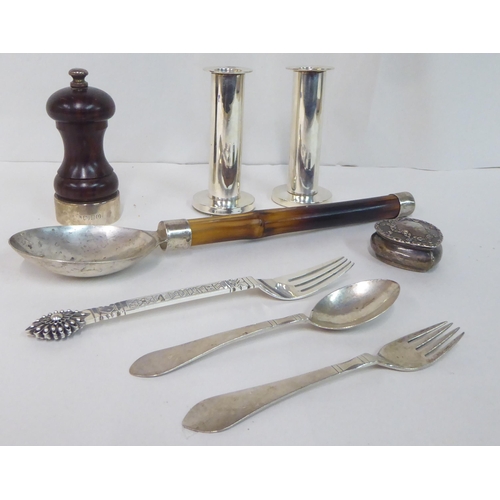 131 - Silver and white metal collectables: to include a Georg Jensen spoon and fork set