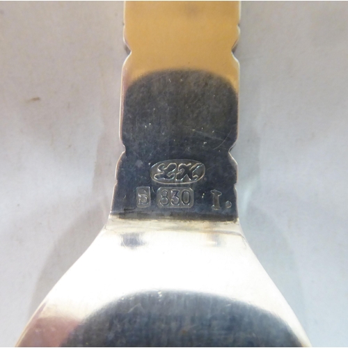 131 - Silver and white metal collectables: to include a Georg Jensen spoon and fork set
