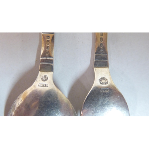 131 - Silver and white metal collectables: to include a Georg Jensen spoon and fork set
