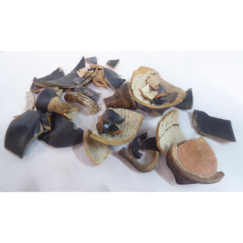 140 - Fragments of ancient painted earthenware items: to include vases  various sizes