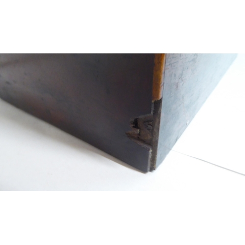 144 - A Georgian mahogany components box tantalus with straight sides and opposing brass bail handles, enc... 