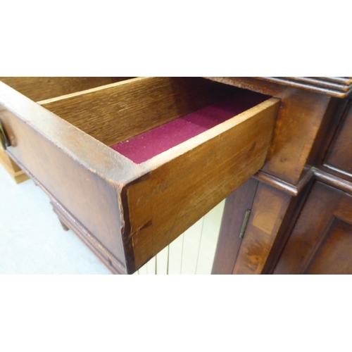 168 - A Regency style mahogany breakfront sideboard, comprising four inline short drawers, over four cupbo... 