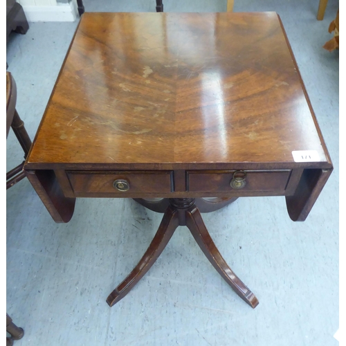 171 - A Victorian style mahogany sofa design table with fall flaps, over a pair of drawers, raised on quad... 