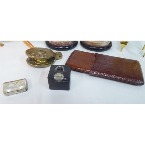 175 - A mixed lot: to include a stitched brown hide cigar wallet; EPNS grape scissors; and two items of br... 