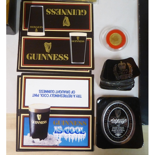 90 - Guinness related collectables: to include a plastic quartz wall timepiece  12