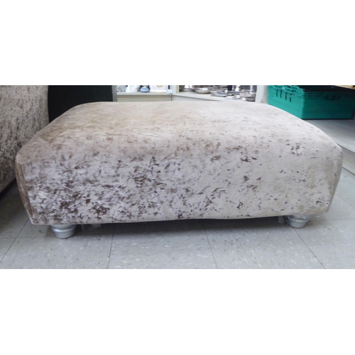 12 - A modern four piece suite, upholstered in silvered effect, shimmer crushed velvet&nbsp; comprising a... 