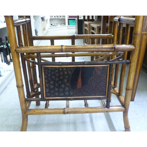 166 - A Victorian style Sino-European bamboo framed stand with shelved superstructure, over a Canterbury b... 
