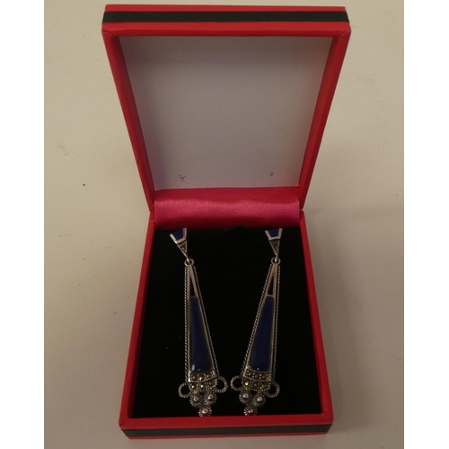 100 - A pair of Art Deco style, silver coloured metal marcasite and lapis lazuli set pendant earrings