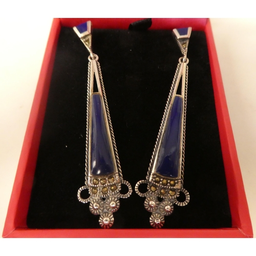 100 - A pair of Art Deco style, silver coloured metal marcasite and lapis lazuli set pendant earrings