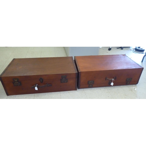 102 - Two vintage hide bound and brown faux hide finished automobile trunks and iron fittings  each 1... 