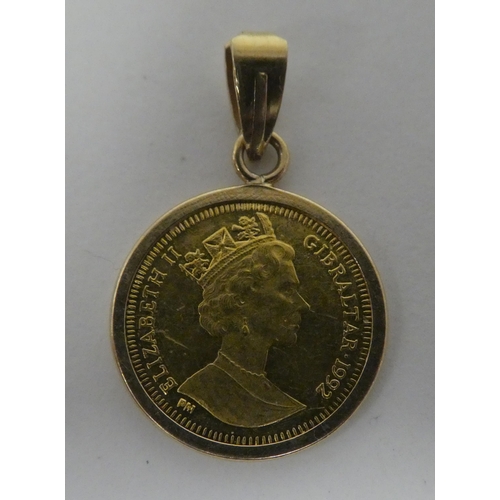 104 - An Elizabeth II Gibraltar coin, in a pendant mount