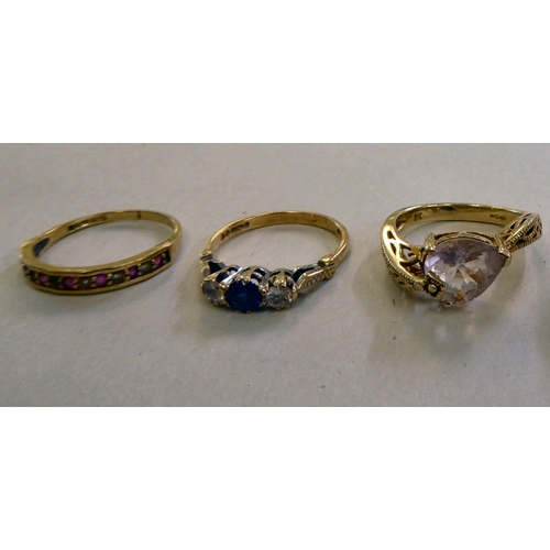 112 - Five 9ct gold rings, variously set with coloured stones