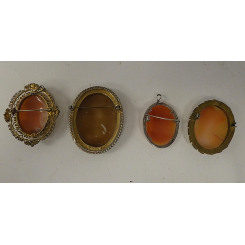 114 - Brooches, mainly porcelain and enamelled: to include cameos