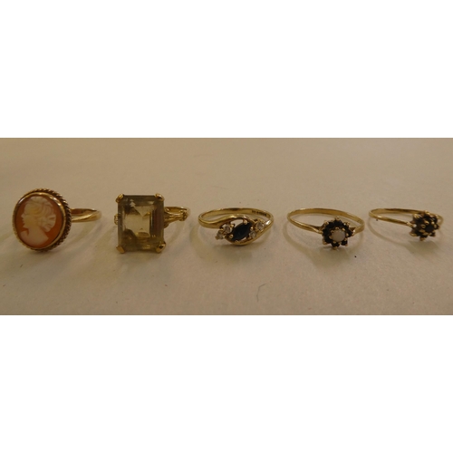 115 - Five 9ct gold rings, variously set with coloured stones