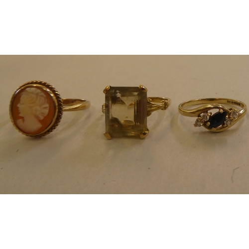 115 - Five 9ct gold rings, variously set with coloured stones