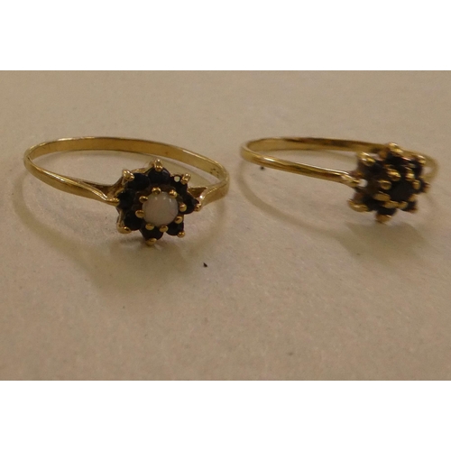 115 - Five 9ct gold rings, variously set with coloured stones