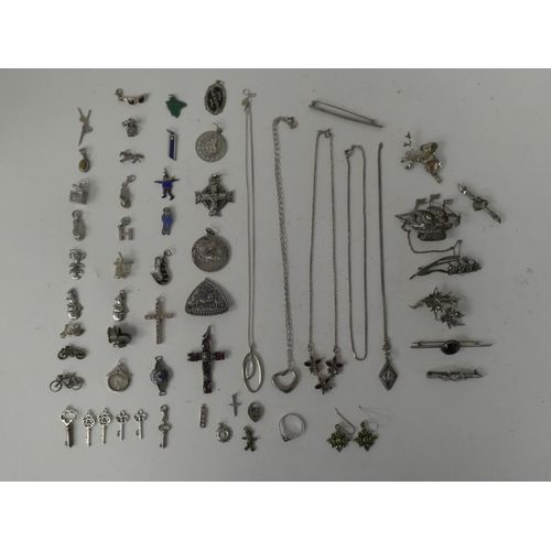 119 - Silver, silver coloured and white metal items of personal ornament: to include brooches; pendants; a... 