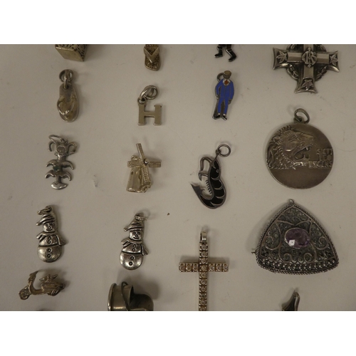 119 - Silver, silver coloured and white metal items of personal ornament: to include brooches; pendants; a... 