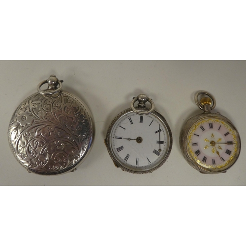 121 - Two ladies silver cased fob watches (A/F); and a silver disc shape powder compact with bright-cut en... 