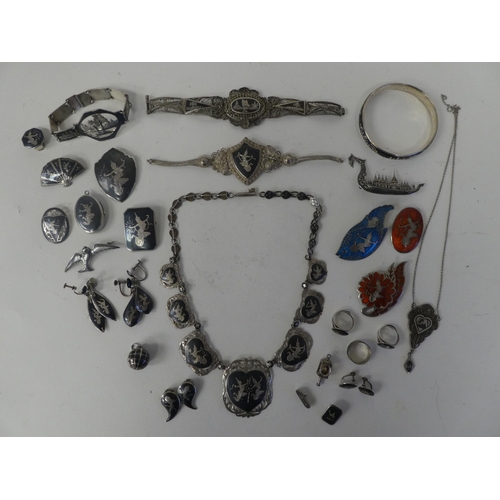 123 - Asian silver, silver coloured metal and enamelled items of personal ornament: to include brooches; a... 