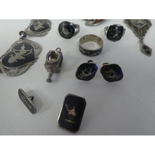 123 - Asian silver, silver coloured metal and enamelled items of personal ornament: to include brooches; a... 