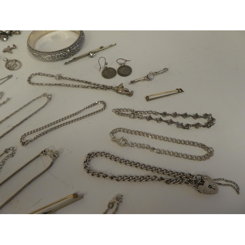 126 - Silver, silver coloured metal and white metal items of personal ornament: to include pendants; chain... 