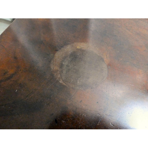 130 - A mid Victorian mahogany tea table, the foldover top with round corners, raised on ring turned, tape... 