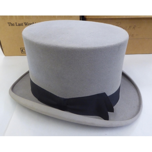 142 - Hats: to include a Gibus folding opera top hat; and other men's fashion accessories