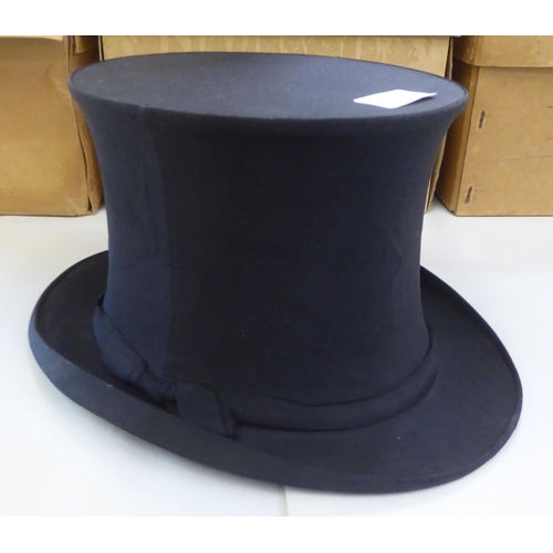 142 - Hats: to include a Gibus folding opera top hat; and other men's fashion accessories