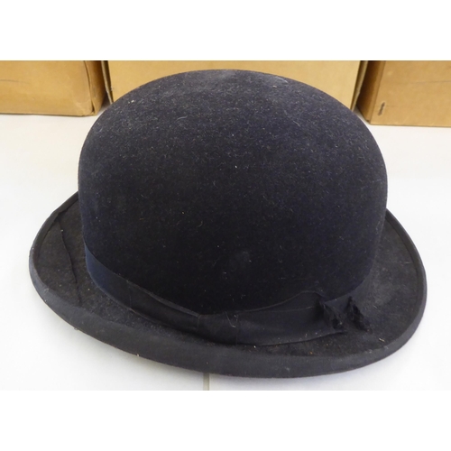 142 - Hats: to include a Gibus folding opera top hat; and other men's fashion accessories