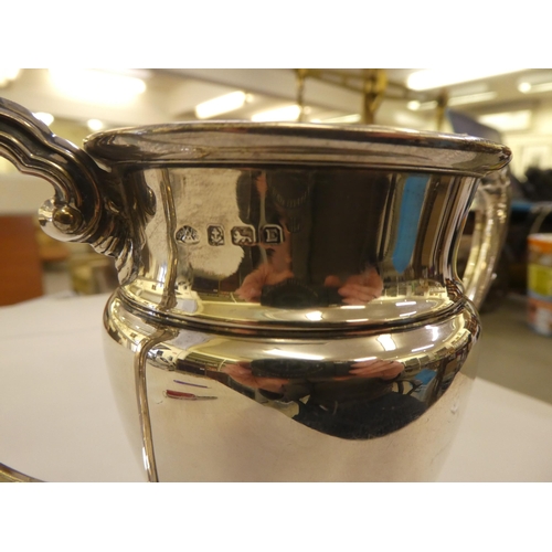 145 - A silver twin handled trophy cup  Birmingham 1929  5.5